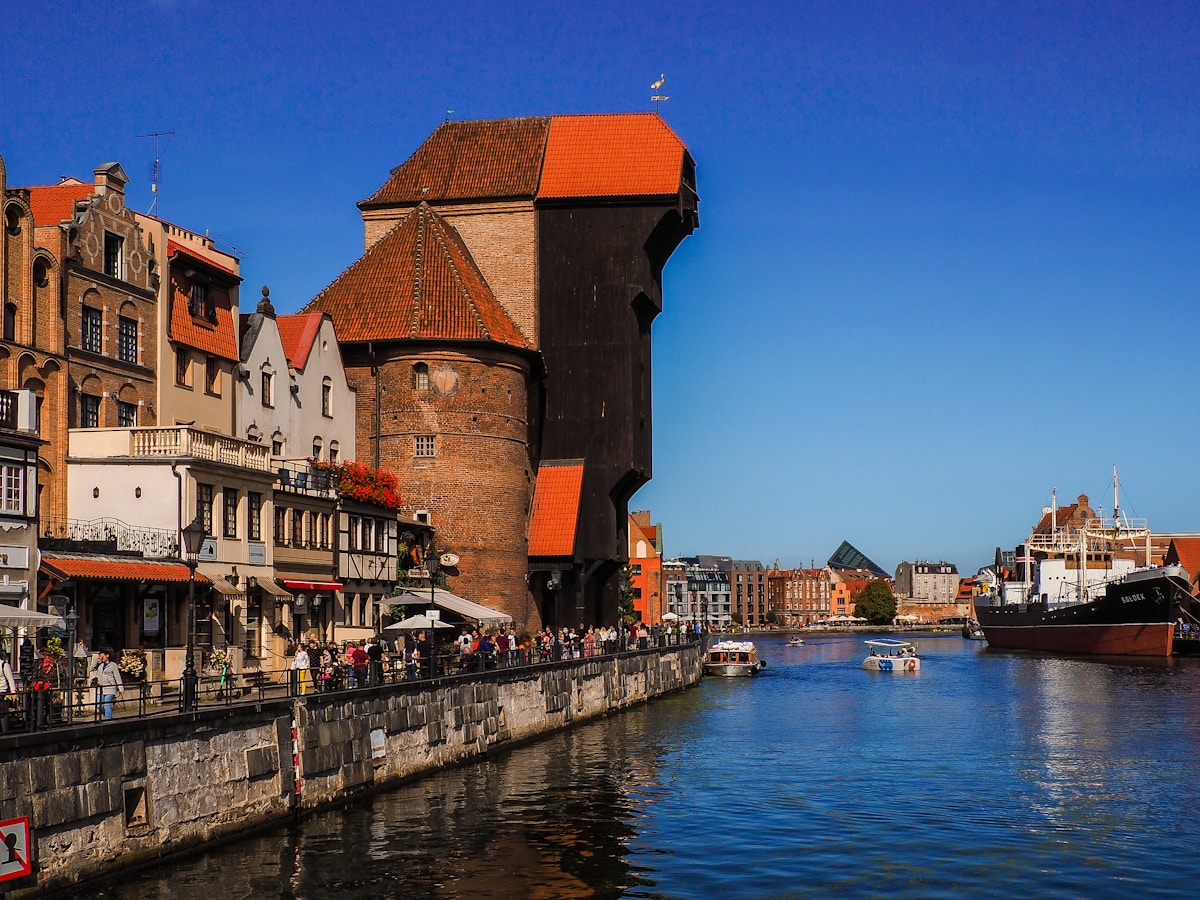 The historic Żuraw crane gate on Gdańsk's waterfront promenade, Poland
