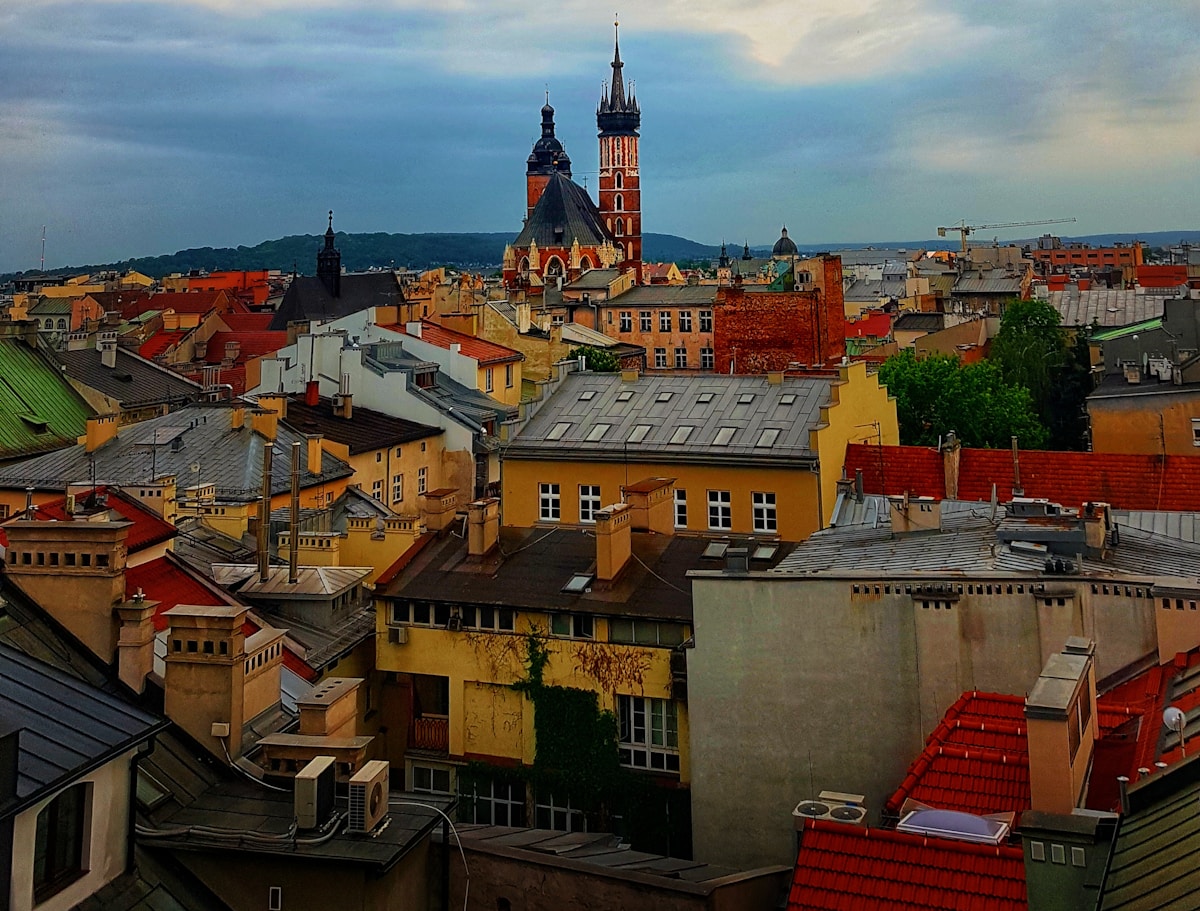 Rooftop view over Kraków Old Town with St Mary's Basilica in the background