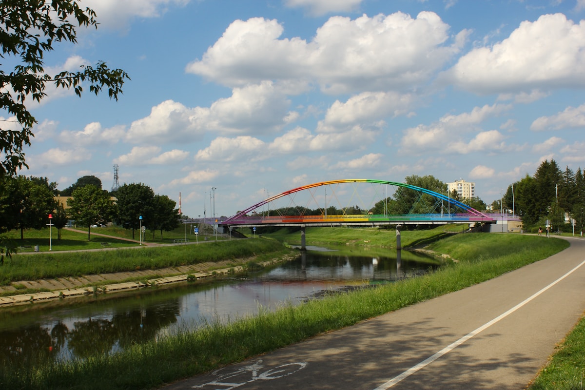 Rainbow arch bridge over the Wisłok river in Rzeszów on a sunny summer day, Subcarpathia, Poland