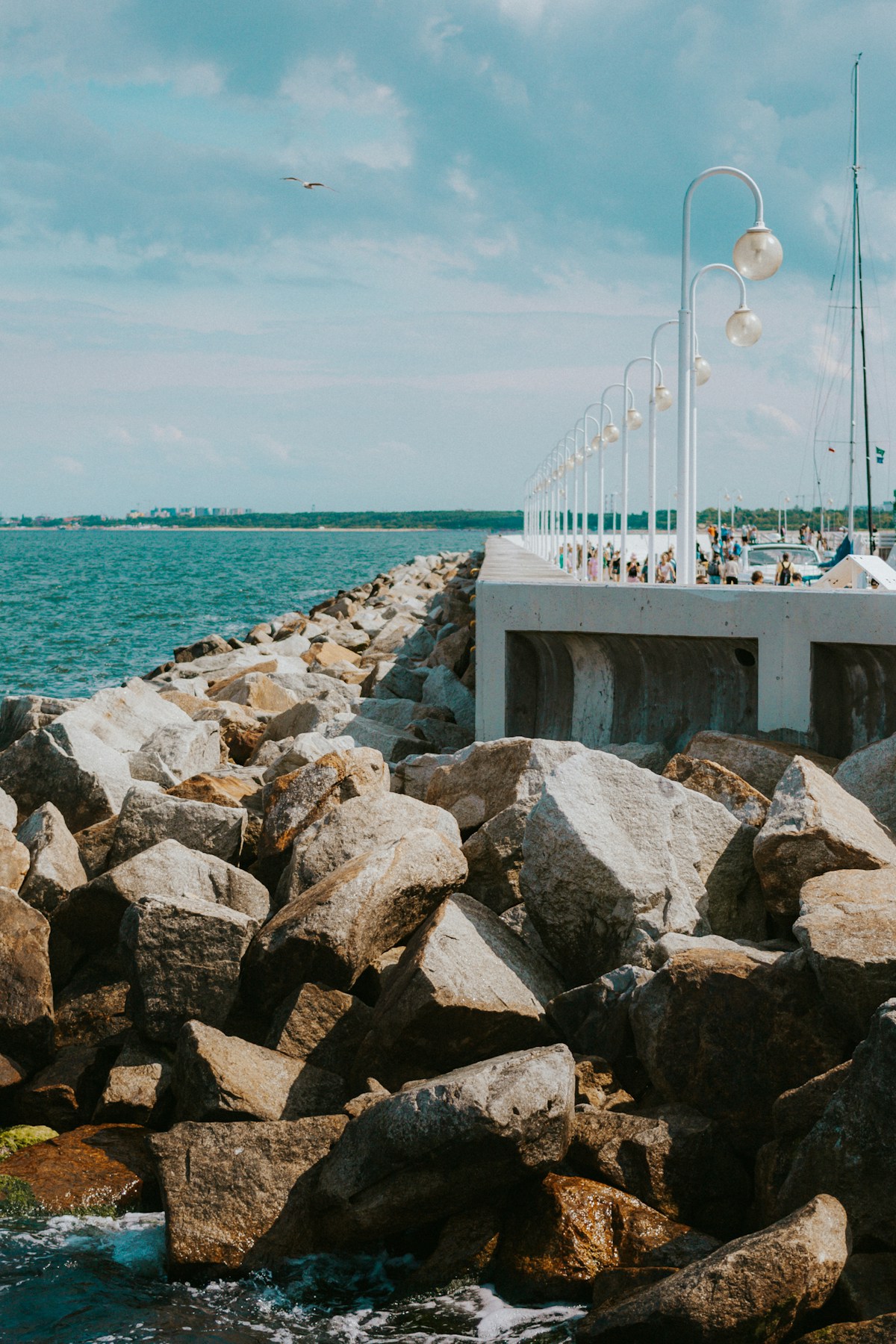 Rocky breakwater pier extending into the Baltic Sea in Sopot, Poland
