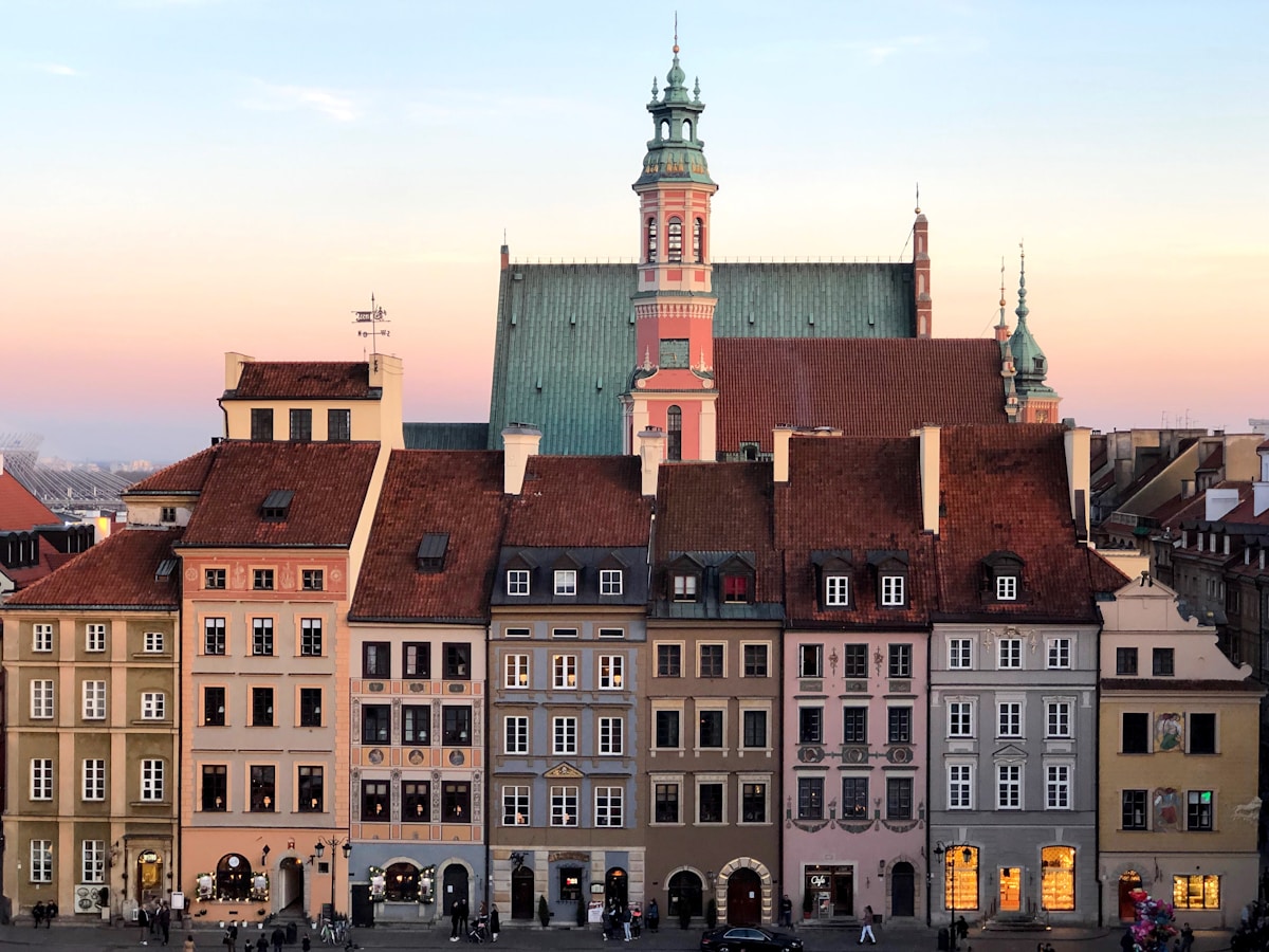 First-time visitor with map exploring Warsaw Old Town, Poland