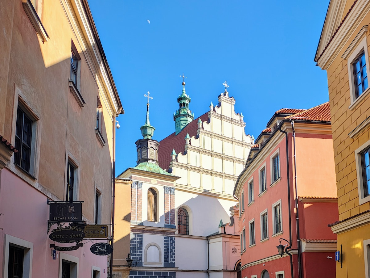 Colourful old town buildings and Dominican church spires in Lublin, Poland