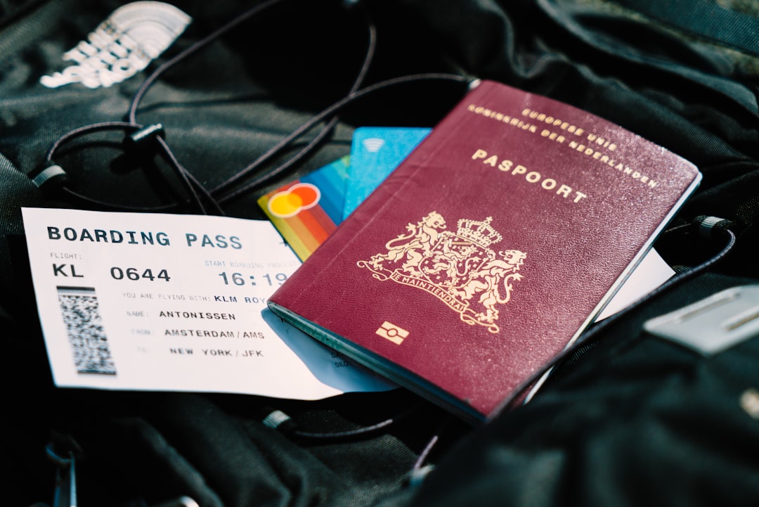 Tourist with backpack and travel documents at a Polish railway station