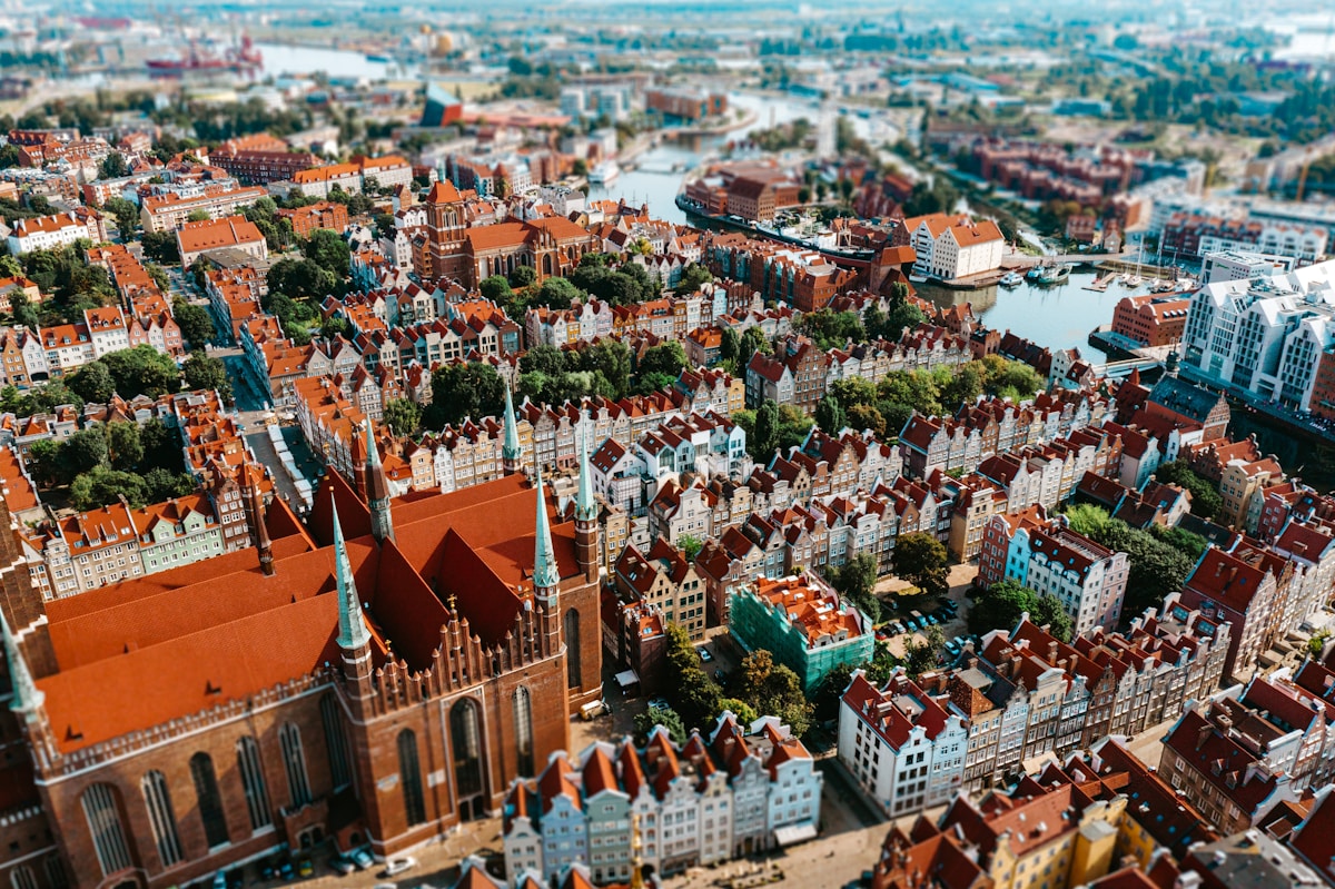 Aerial view of Gdańsk old town with colourful facades and red rooftops, Poland